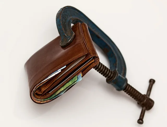 credit squeeze, taxation, purse, tax, economic stress, tight budget, consumerism, currency, inflation, financial difficulty, finance, cash, debt, bankruptcy, economy, crisis, savings, expenses, recession, money, wallet, tax, inflation, inflation, inflation, inflation, inflation, debt, debt, debt, recession, money, money, wallet. Northern Ireland payroll software: features to check